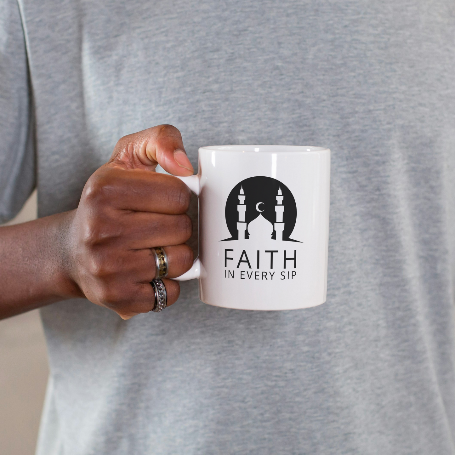 White mug with mosque silhouette and crescent moon, text “Faith in Every Sip” in bold black Islamic design.