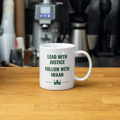 White mug with the quote “Lead with Justice, Follow with Imaan” and a mosque silhouette – perfect Islamic gift for a mindful Muslim man.
