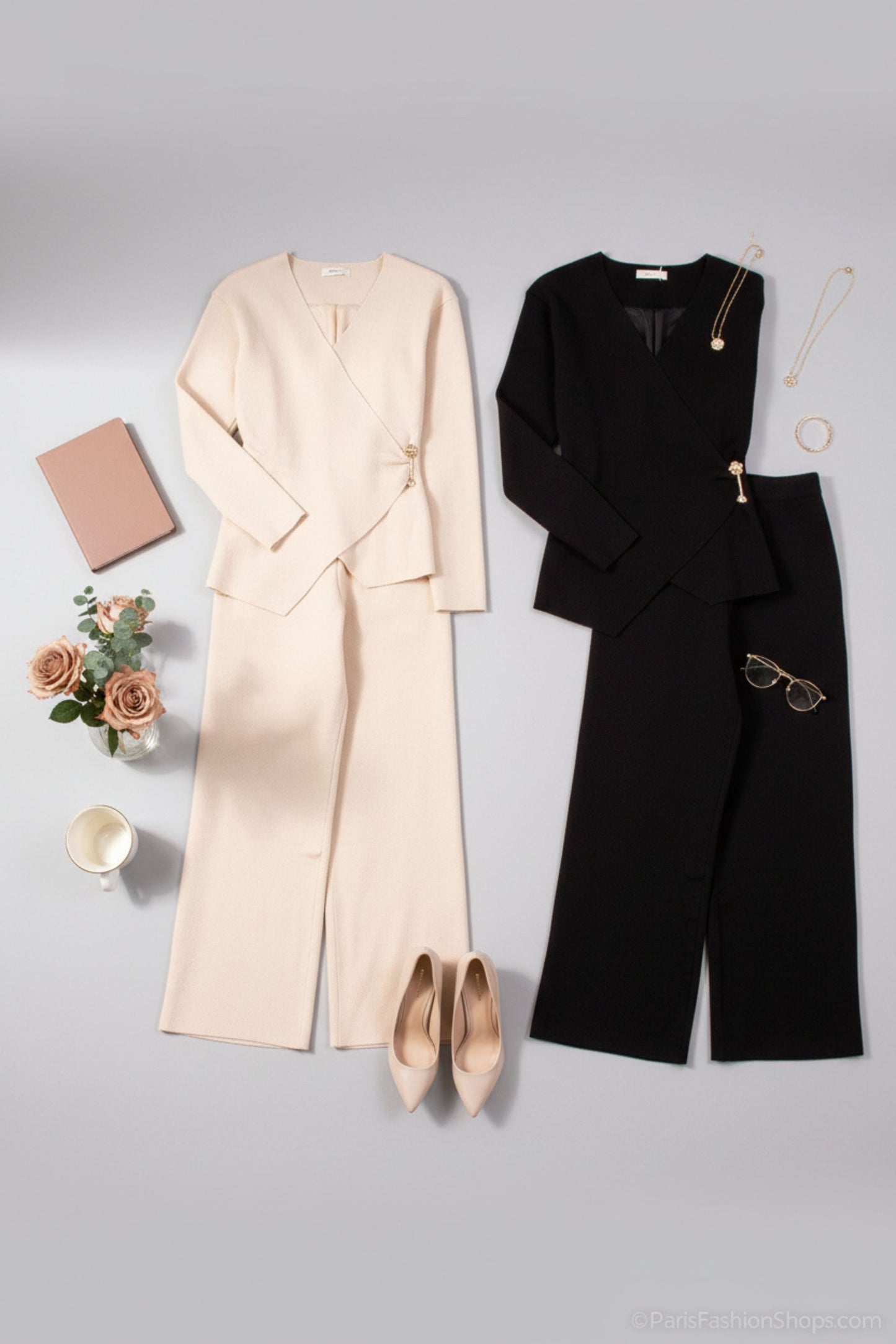 Two outfits laid out on a gray surface with accessories.