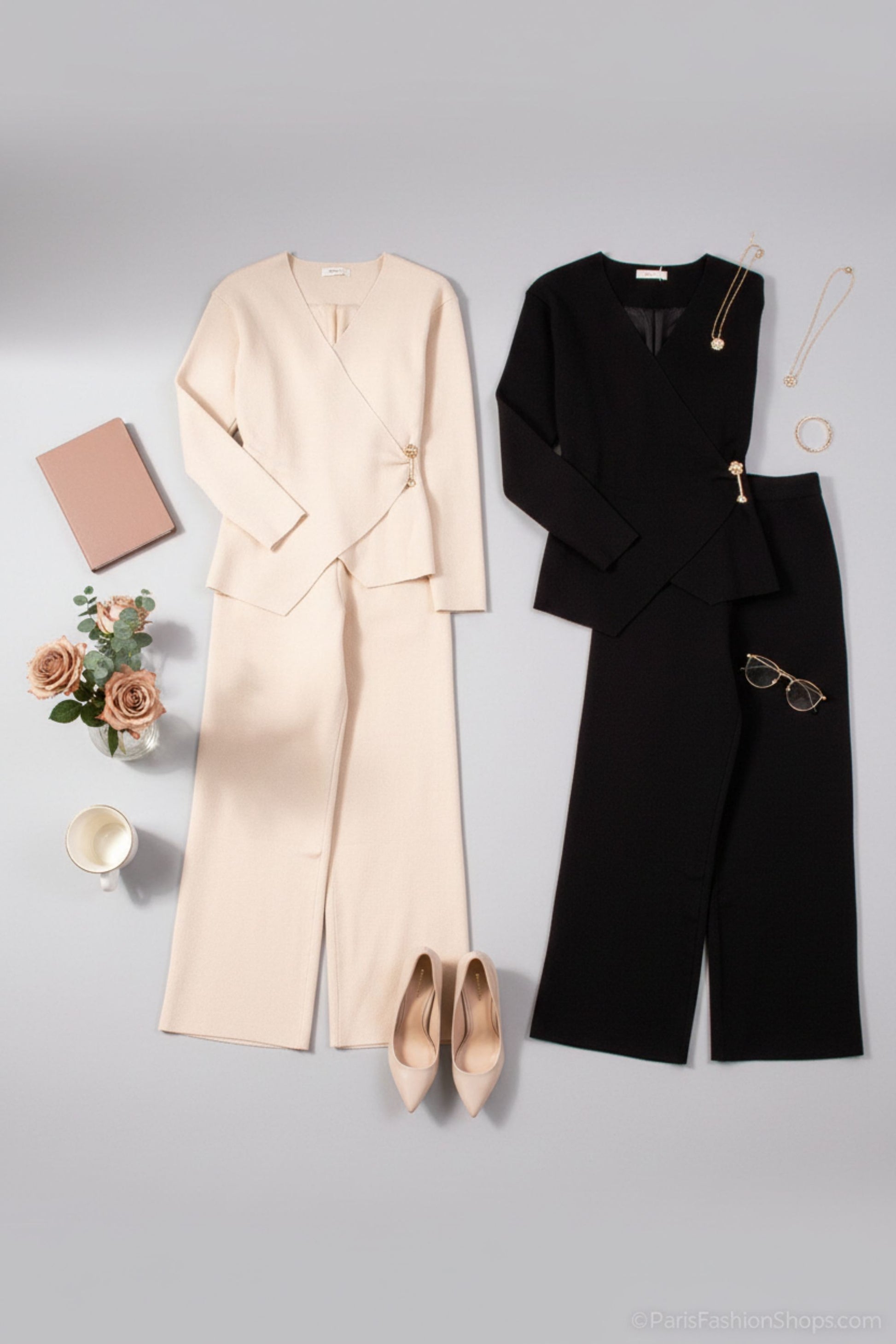 Two outfits laid out on a gray surface with accessories.